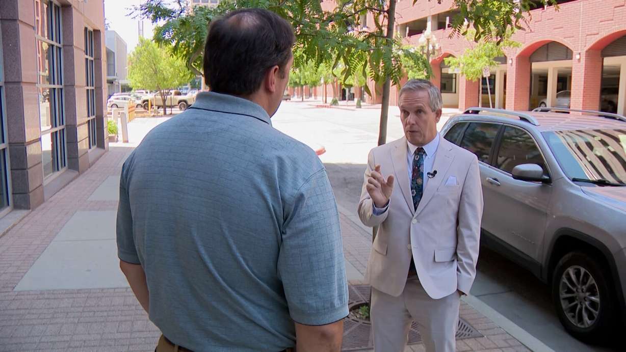 Financial planner Shane Stewart talks with KSL-TV's Matt Gephardt, Wednesday. Stewart said people with strong credit scores or histories can refinance their car loan.