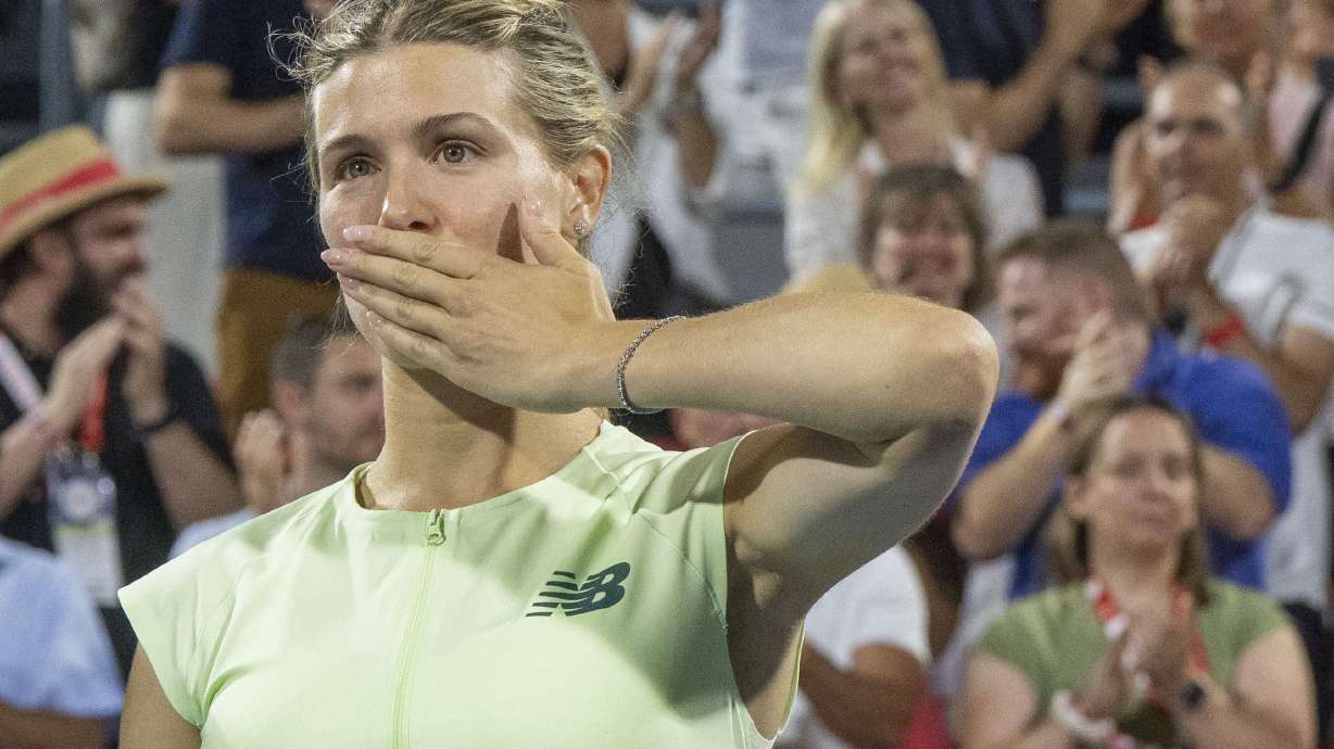 Eugenie Bouchard of Canada blows a kiss to the crowd following her retirement ceremony following second round tennis action at the National Bank Open in Montreal, Wednesday, July 30, 2025.
