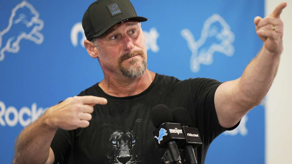 Detroit Lions head coach Dan Campbell gestures during a news conference before Back Together Weekend at NFL football training camp Saturday, July 26, 2025, in Allen Park, Mich.