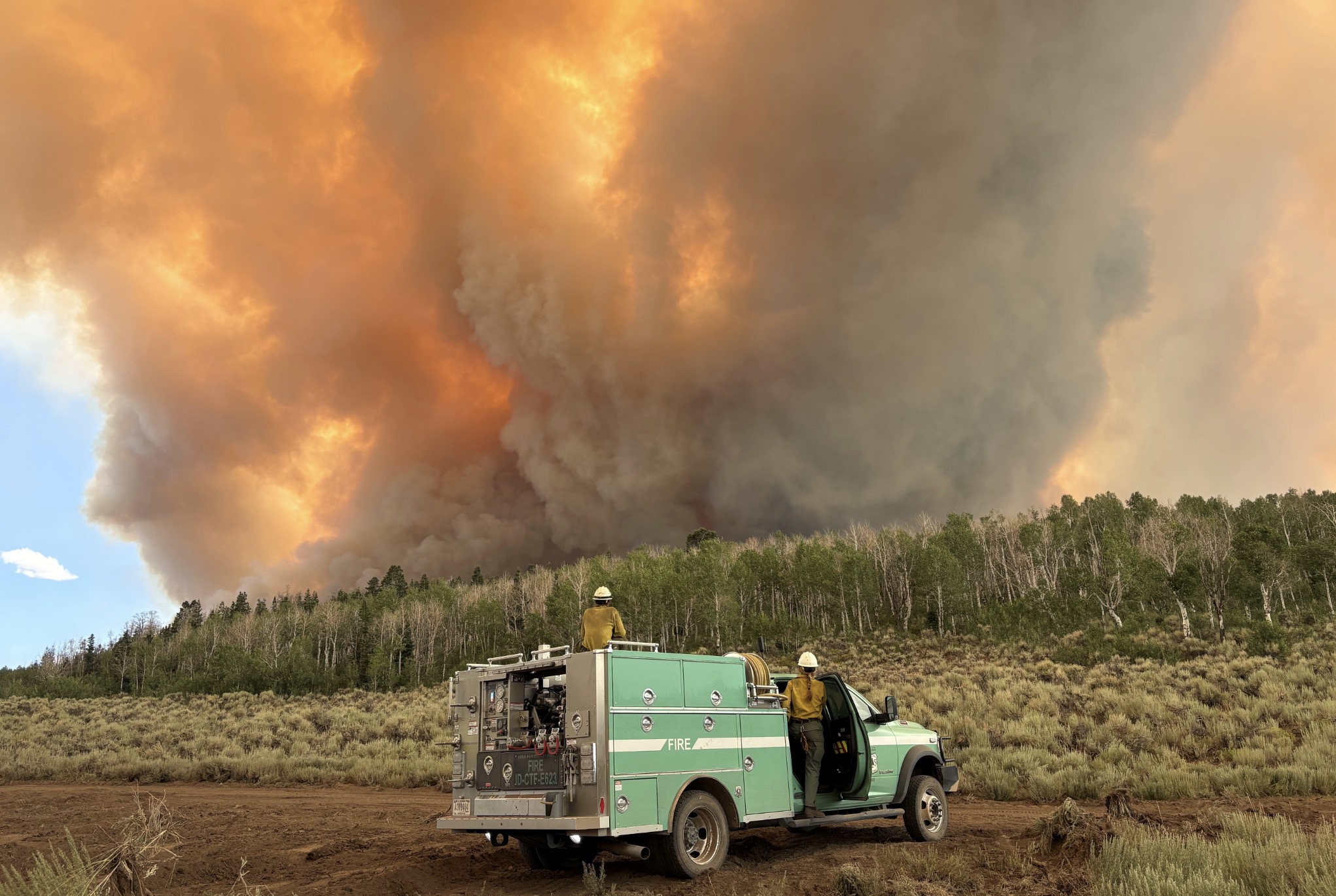 Monroe Canyon Fire destroys 12 power poles; crews 'forced to retreat' because of conditions