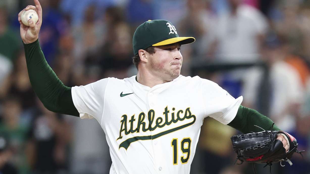 Athletics pitcher Mason Miller throws to the Toronto Blue Jays during the ninth inning of a baseball game Saturday, July 12, 2025, in West Sacramento, Calif.