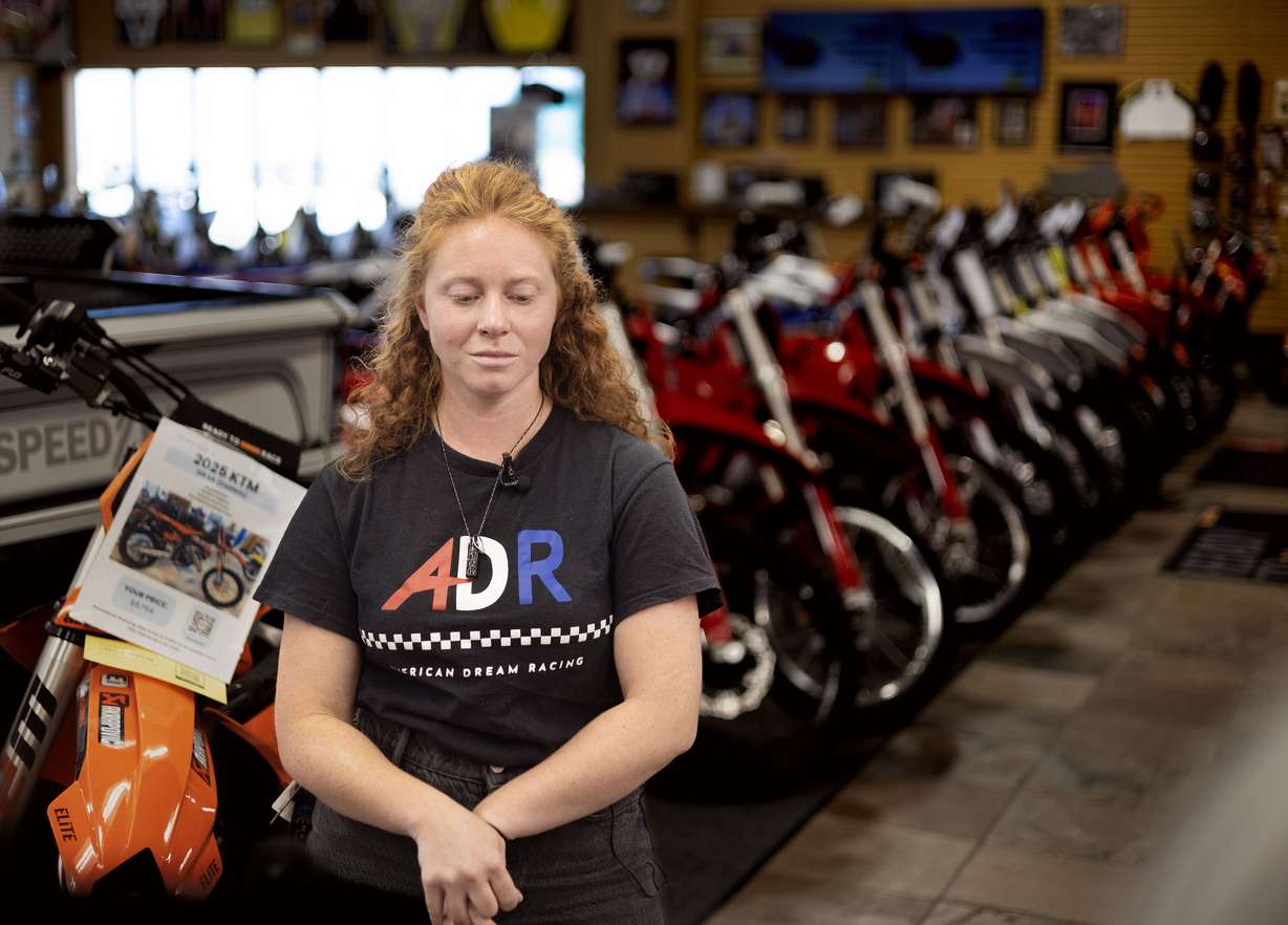 Darby Coffen, the widow of Charlie Coffen, who died one year ago in a single-vehicle motorcycle crash near Moab, speaks to the media at Edge Powersports in Draper on Thursday. In the wake of an alarming spike in motorcycle fatalities, the Utah Department of Public Safety is urging motorcyclists to change the way they ride on Utah roads.