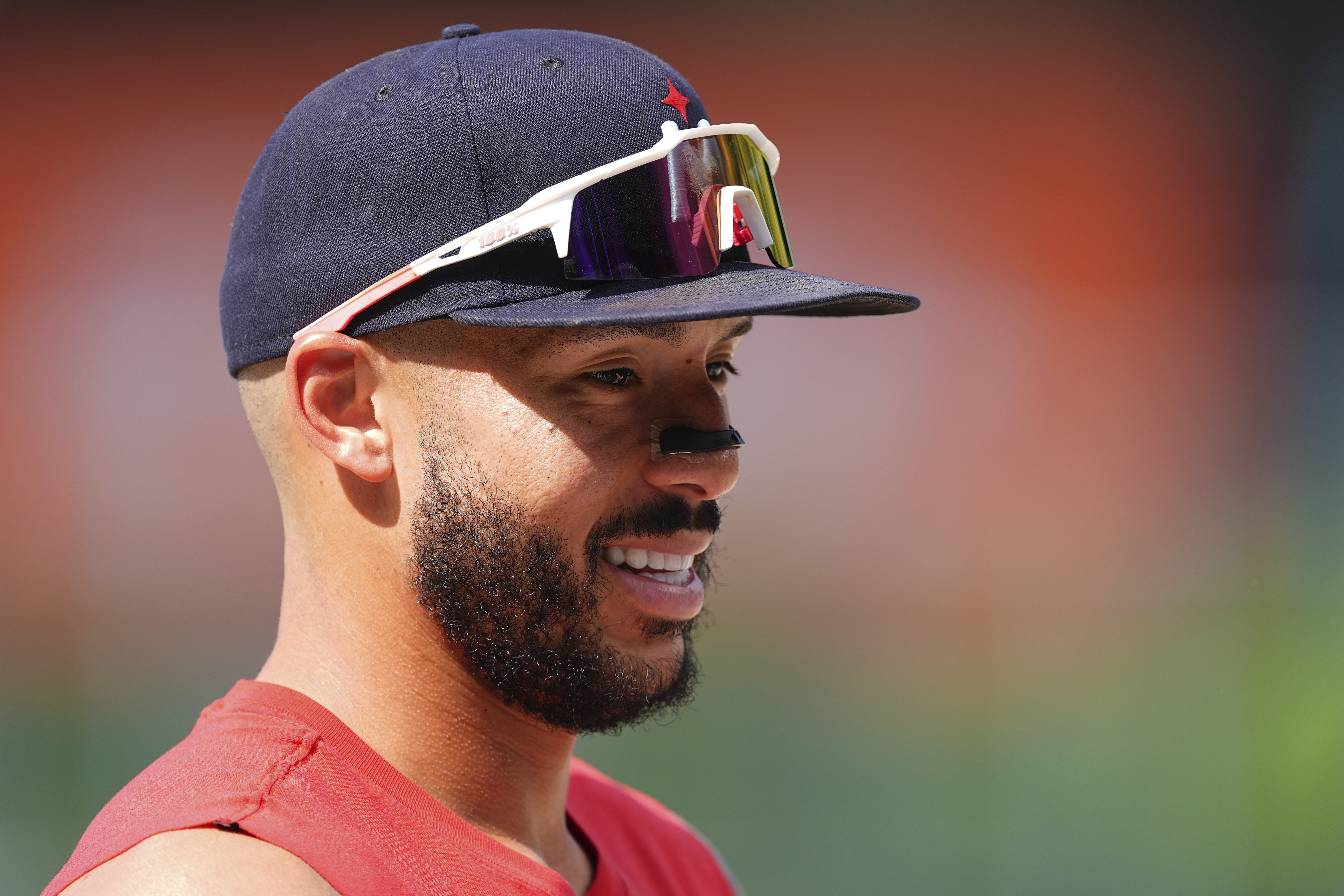 Minnesota Twins shortstop Carlos Correa warms up before a baseball game against the Colorado Rockies, Saturday, July 19, 2025, in Denver. 