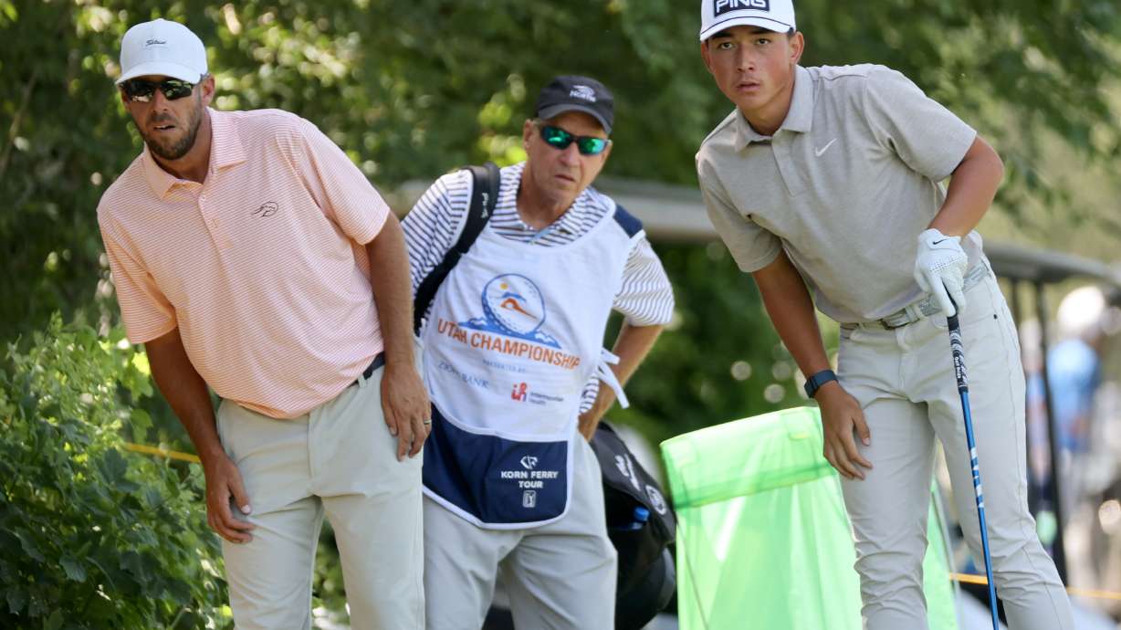 Cole Howard and Kihei Akina watch Akina’s shot during the Korn Ferry Tour Utah Championship at the Ogden Golf and Country Club in Ogden on Thursday, July 31, 2025.