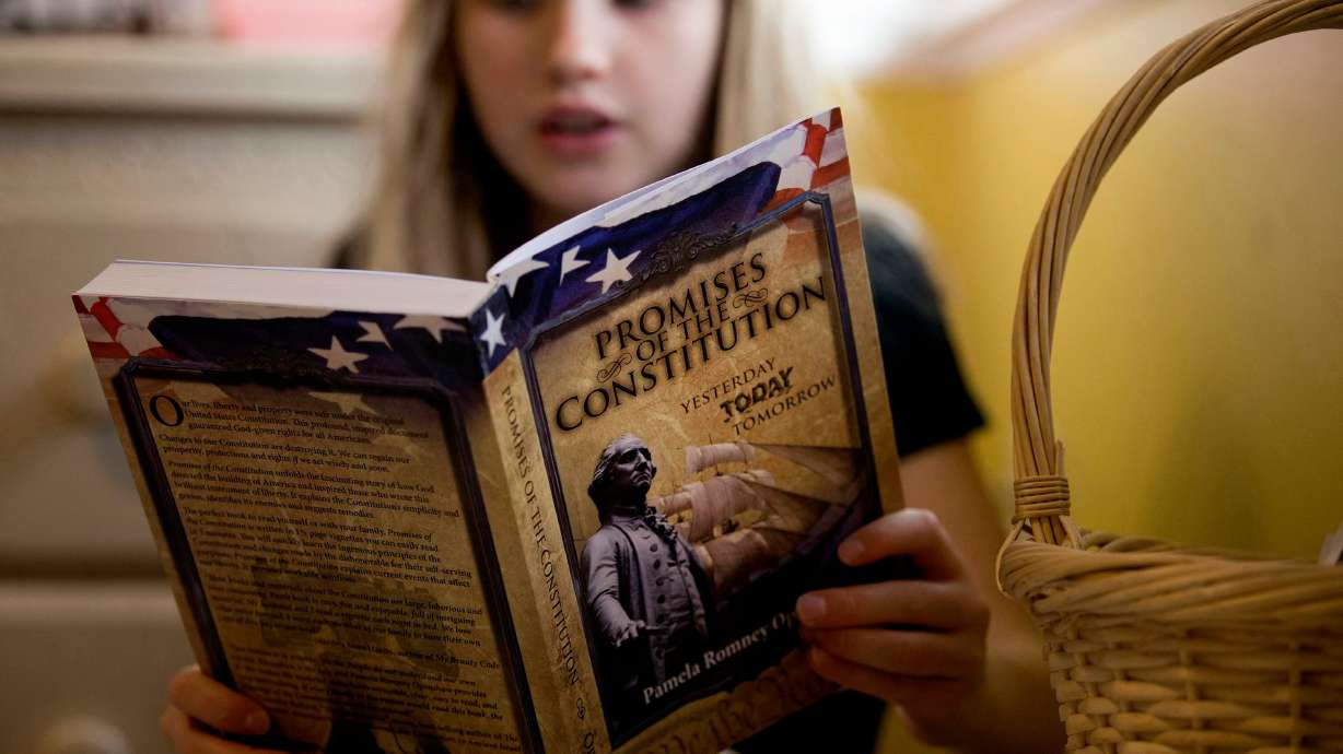 A girl reads a book during homeschooling at her West Jordan home on Nov. 3, 2017. A new poll shows Utahns support using Utah Fits All funds for learning activities but not outdoor adventure.