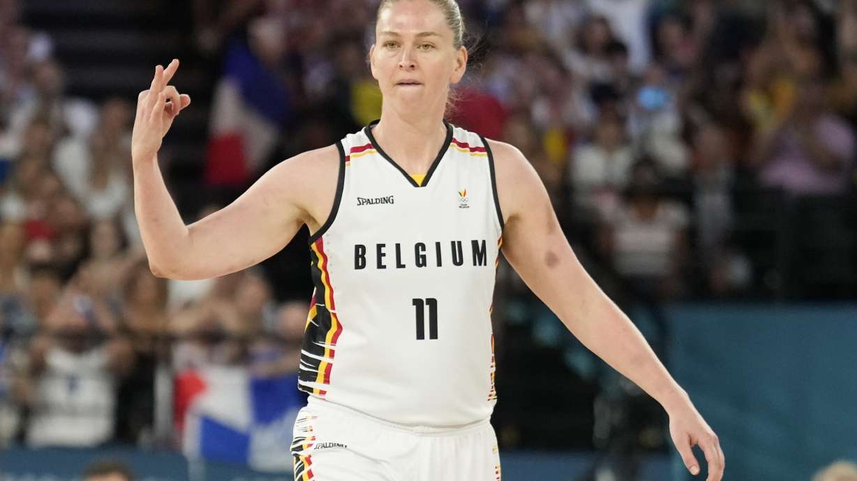 FILE - Emma Meesseman (11), of Belgium, reacts to a three pointer during a women's bronze medal basketball game at Bercy Arena at the 2024 Summer Olympics, Aug. 11, 2024, in Paris, France.