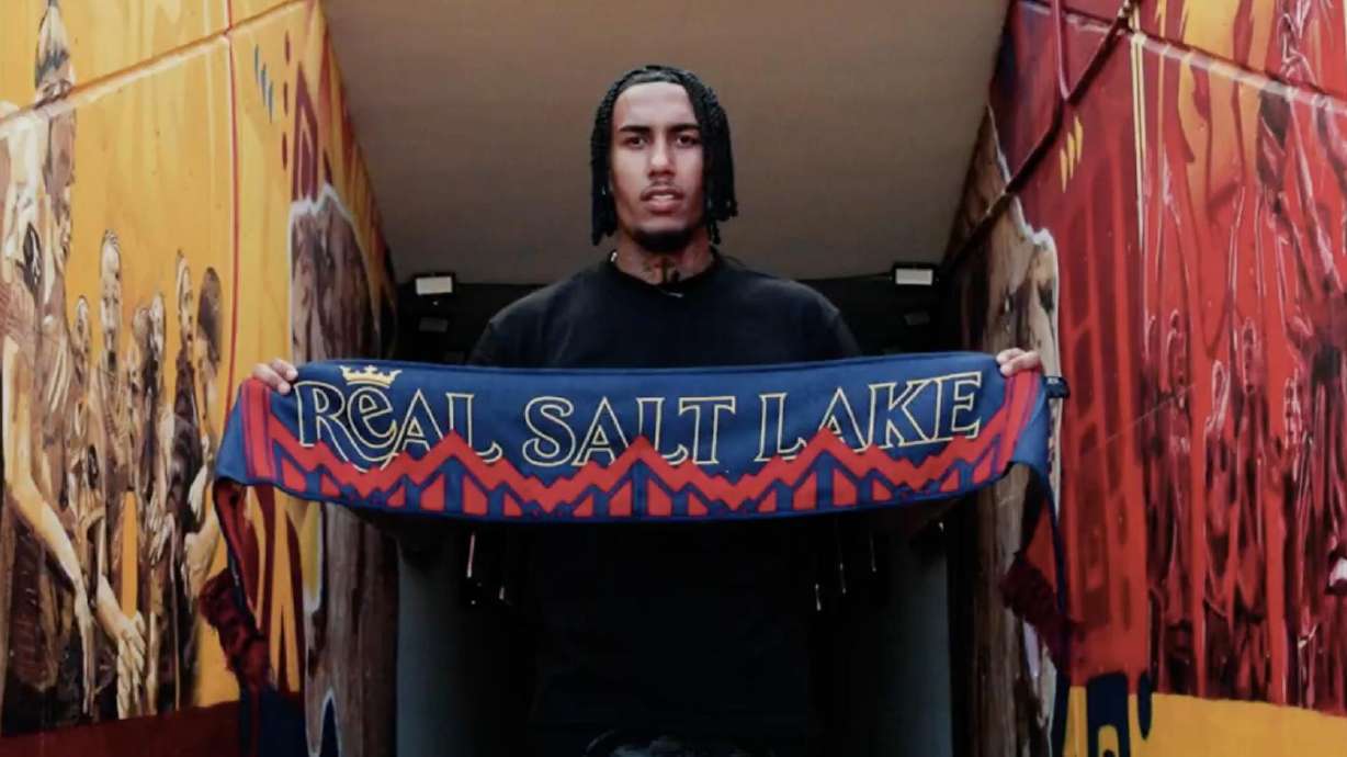New RSL signing Rwan Cruz with the team's scarf.