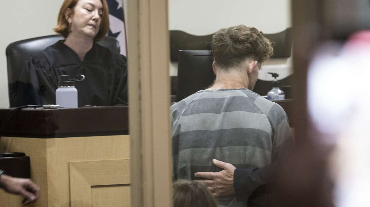 Andrew James McGann, charged with two counts of capital murder, appears for a bond hearing in Fayetteville, Ark. Authorities say he admitted to killing a couple he didn't know who were hiking with two of their children in an Arkansas state park Saturday.