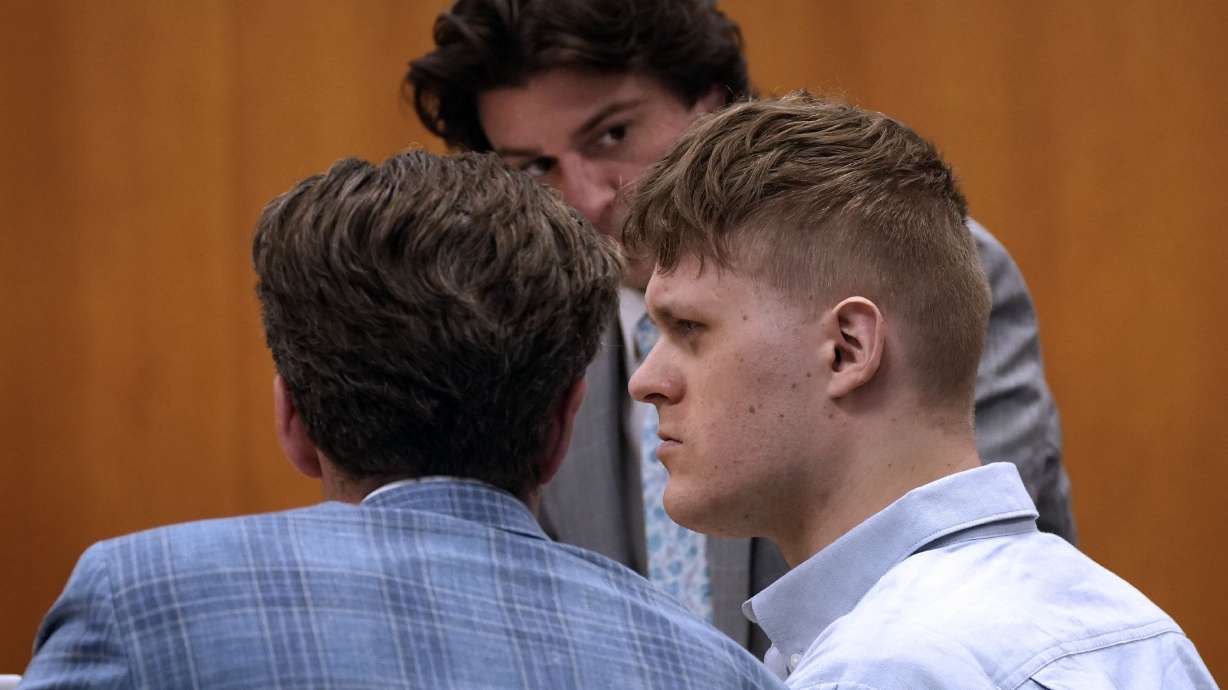 Maxwell Anderson with his defense attorneys in circuit court on June 5, in Milwaukee, Wis. Anderson was sentenced to life in prison Friday after killing and dismembering a college student on their first date.
