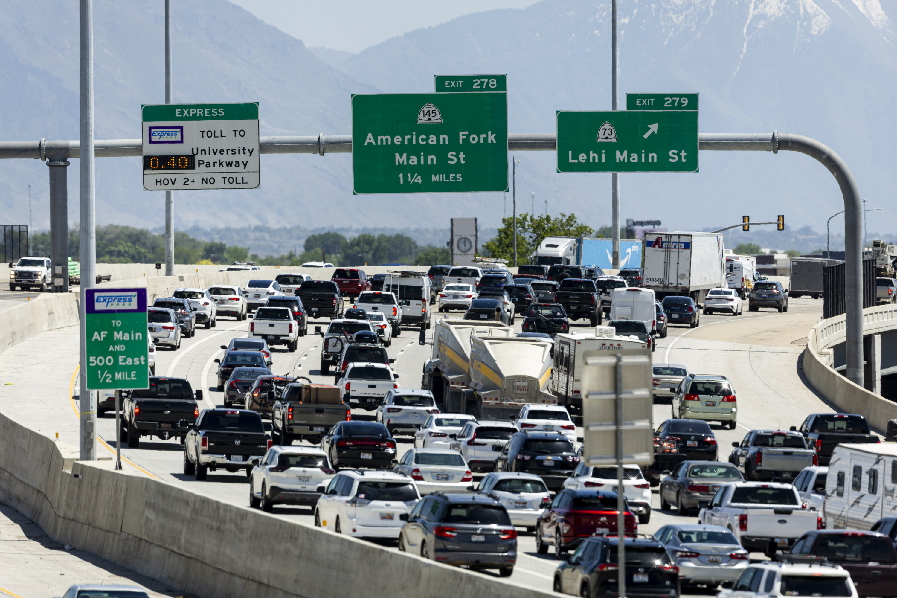 Cars slowly move through traffic on southbound I-15 in Lehi on May 23, 2025.