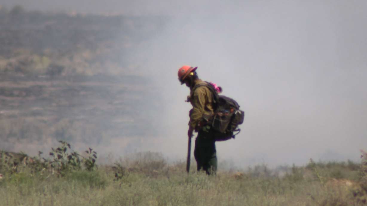 Crews battle the Monroe Canyon Fire in Sevier County on Friday. Meteorologists say a shift in the normal monsoon pattern changed Utah's precipitation fortunes this summer, leaving most of the state with above-normal fire potential this month.