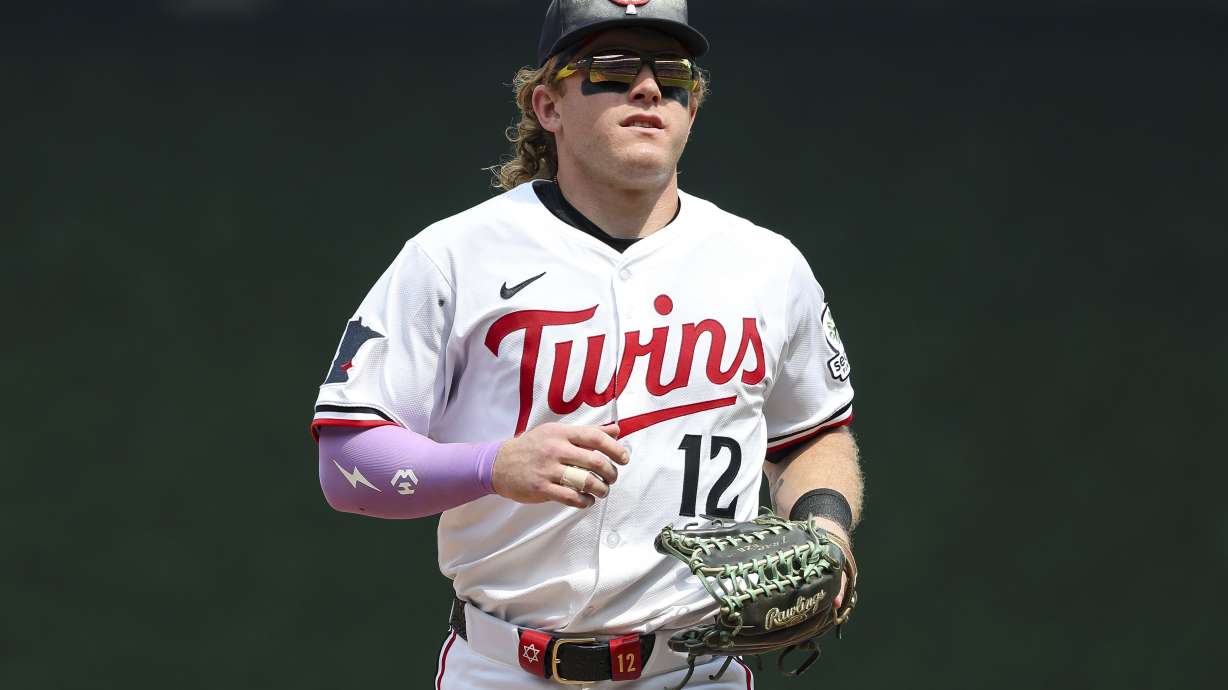 Minnesota Twins center fielder Harrison Bader runs into the dugout during the ninth inning of baseball game against the Boston Red Sox, Wednesday, July 30, 2025, in Minneapolis.