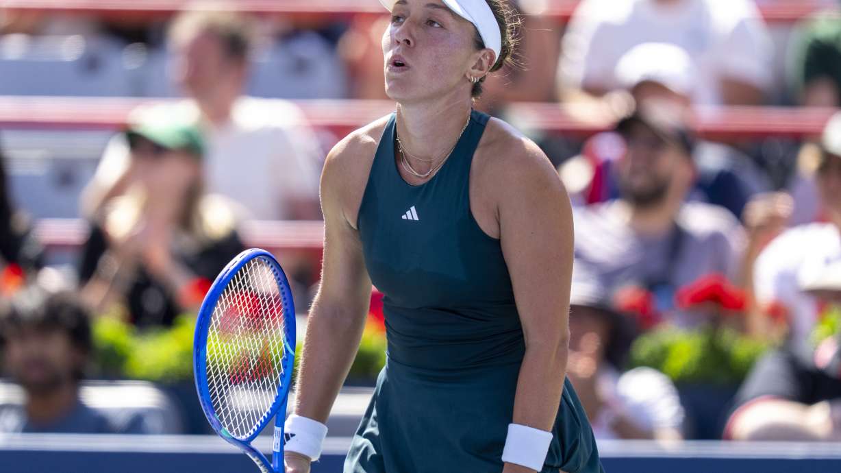 Jessica Pegula, of the United States, reacts during her third-round match against Anastasija Sevastova, of Latvia, at the National Bank Open women's tennis tournament in Montreal, Friday, Aug. 1, 2025.