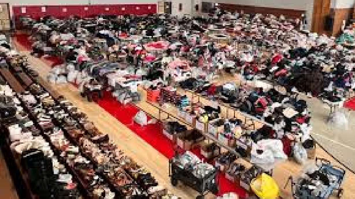 A gym is filled with clothes, bedding items, shoes and more for the Davis Community Closet back-to-school giveaway. The event is one of the few of its kind to offer clothes, including underwear and new socks, to Davis County students and families.