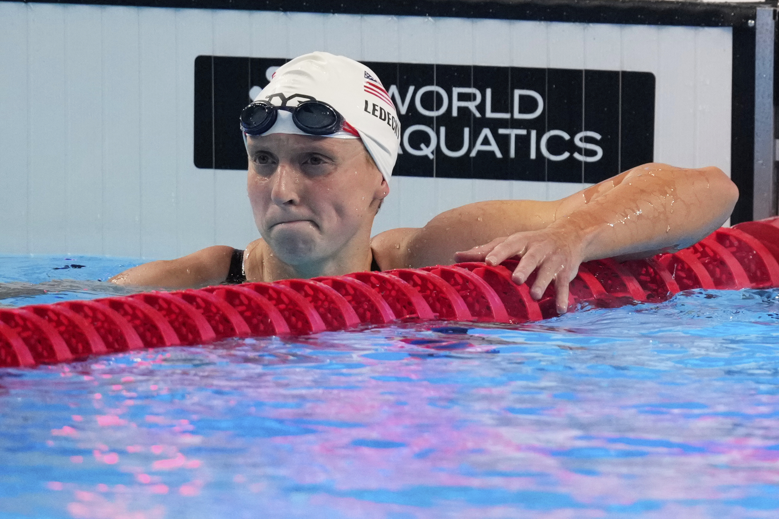 Katie Ledecky of the United States reacts after competing in the women's 800-meter freestyle heats at the World Aquatics Championships in Singapore, Friday, Aug.1, 2025.