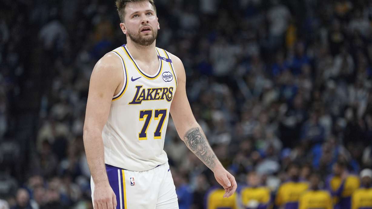 FILE - Los Angeles Lakers guard Luka Doncic (77) reacts after a foul called on the Lakers during the first half of Game 4 of an NBA basketball first-round playoff series against the Minnesota Timberwolves, Sunday, April 27, 2025, in Minneapolis.