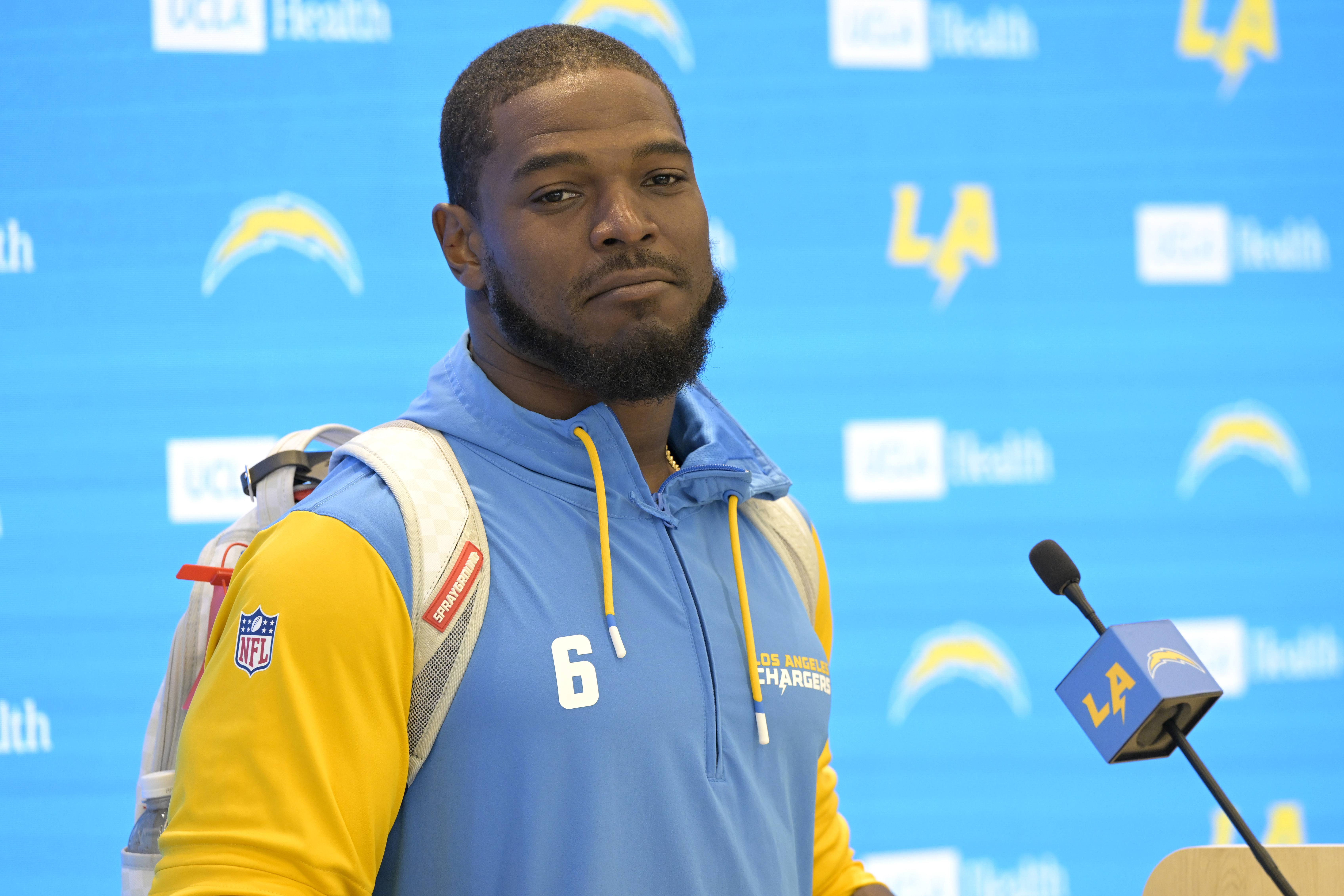 FILE - Los Angeles Chargers linebacker Denzel Perryman speaks with the media during NFL football practice Tuesday, May 20, 2025, in El Segundo, Calif.