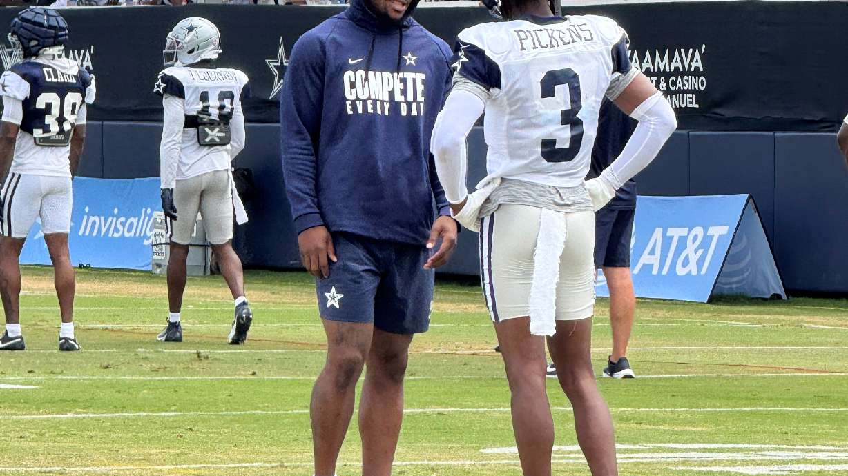 Dallas Cowboys' Linebacker Micah Parsons, left, speaks with wide receiver George Pickens during the Dallas Cowboys NFL Football training camp in Oxnard, Calif., Saturday, Aug. 2, 2025.