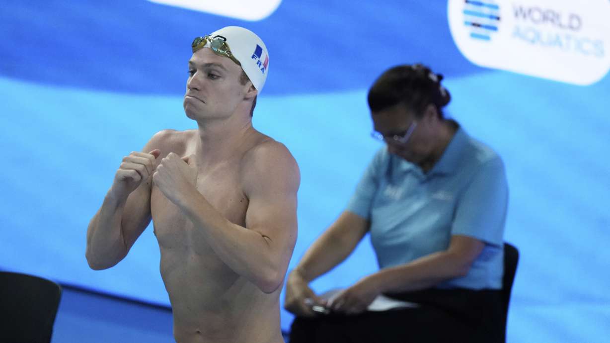 Leon Marchand of France prepares to compete in the men's 400-meter individual medley heats at the World Aquatics Championships in Singapore, Sunday, Aug. 3, 2025.