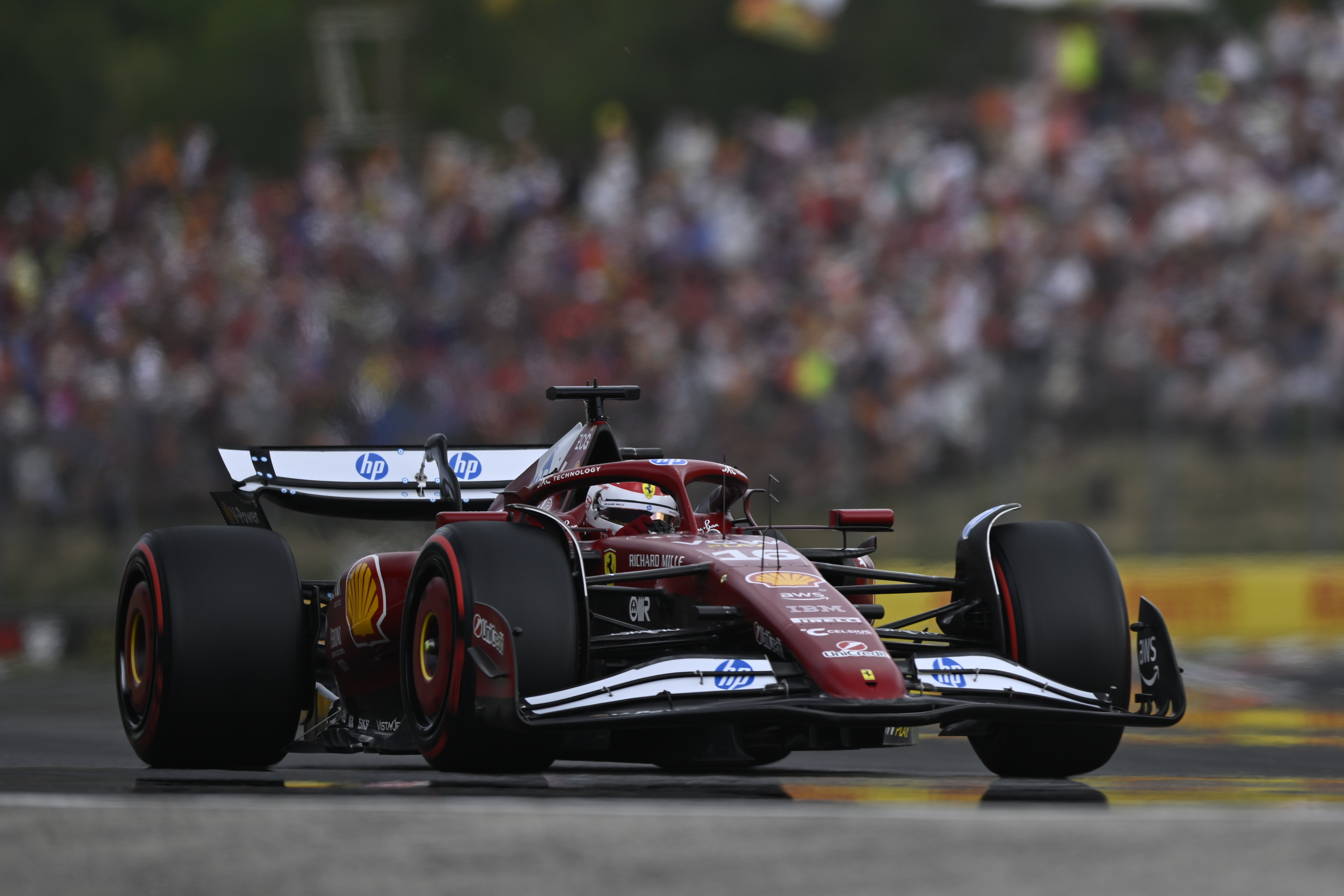 Ferrari driver Charles Leclerc of Monaco steers his car during the qualifying session for the Hungarian Formula One Grand Prix at the Hungaroring racetrack in Mogyorod, Hungary, Saturday, Aug. 2, 2025.