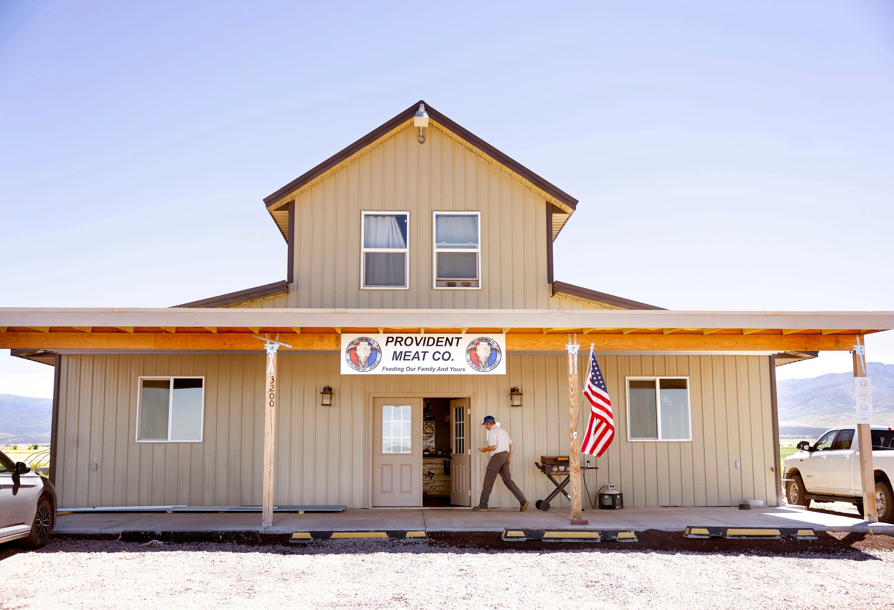 Aaron Rees, owner and operator of Provident Meat Company, cooks lunch for his employees at his meat cutting business in Fillmore on July 30.