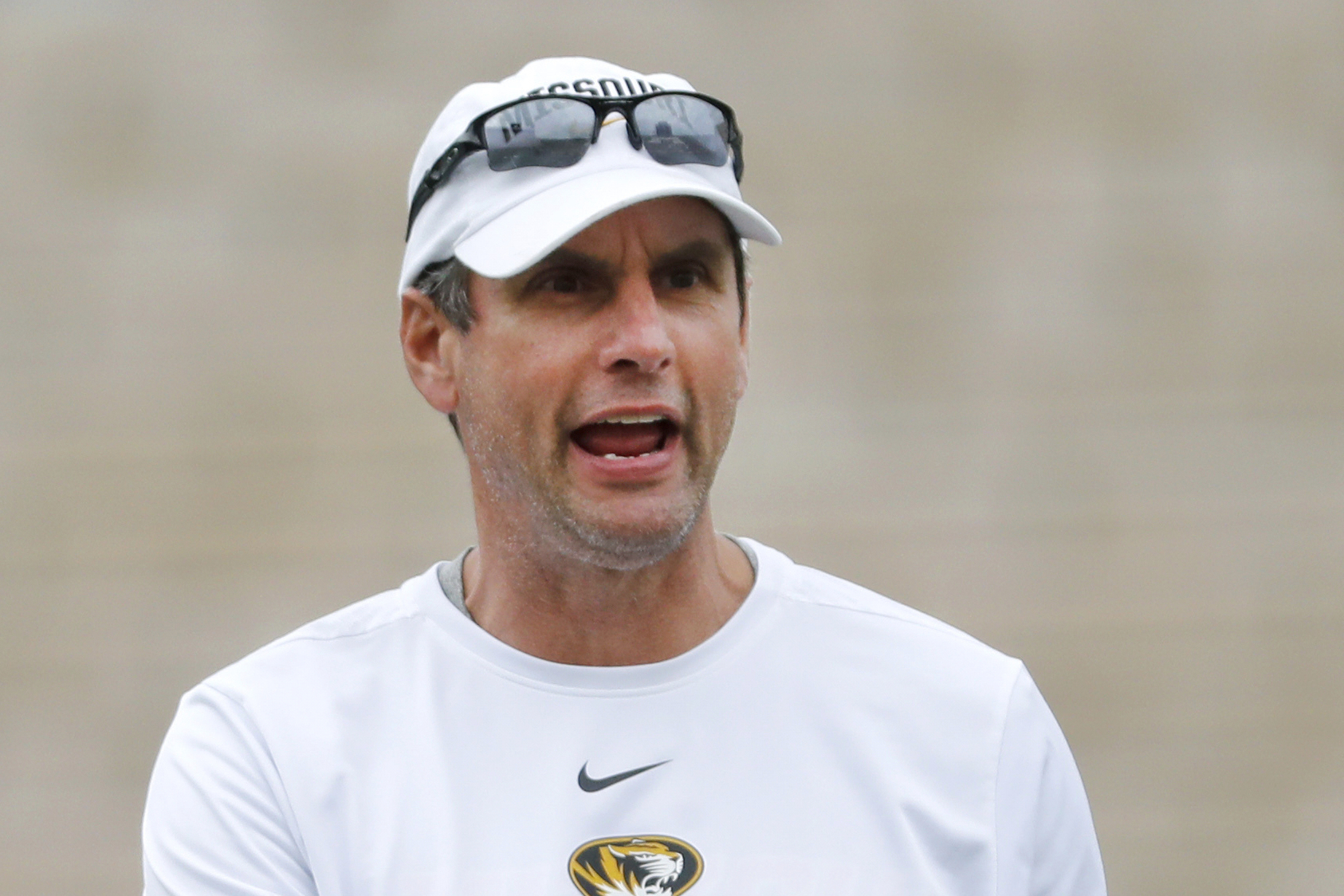 FILE - Missouri offensive coordinator Derek Dooley calls out instructions during an NCAA college football practice, Aug. 12, 2019, in Columbia, Mo.