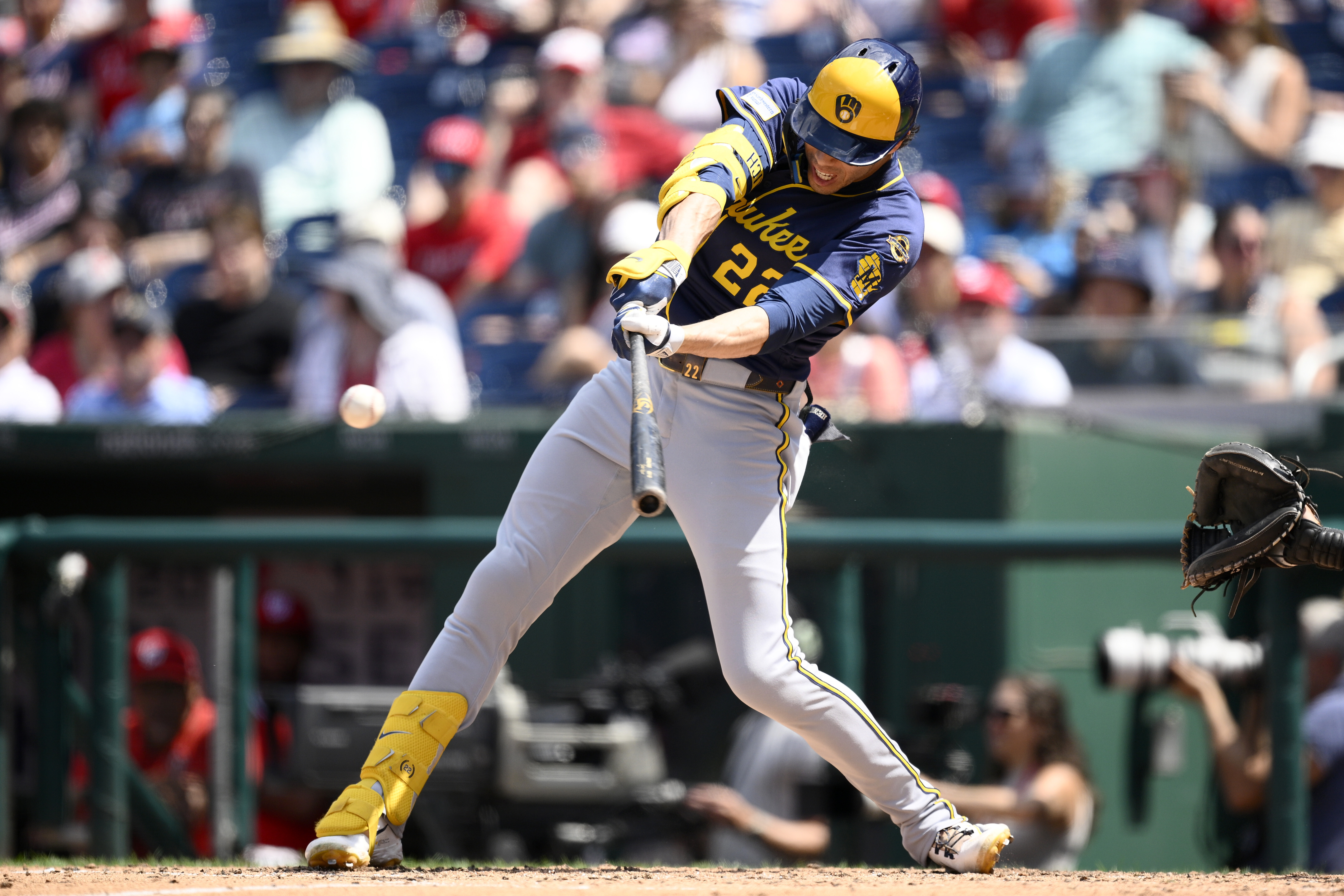 Milwaukee Brewers' Christian Yelich singles during the fifth inning of a baseball game against the Washington Nationals, Sunday, Aug. 3, 2025, in Washington.
