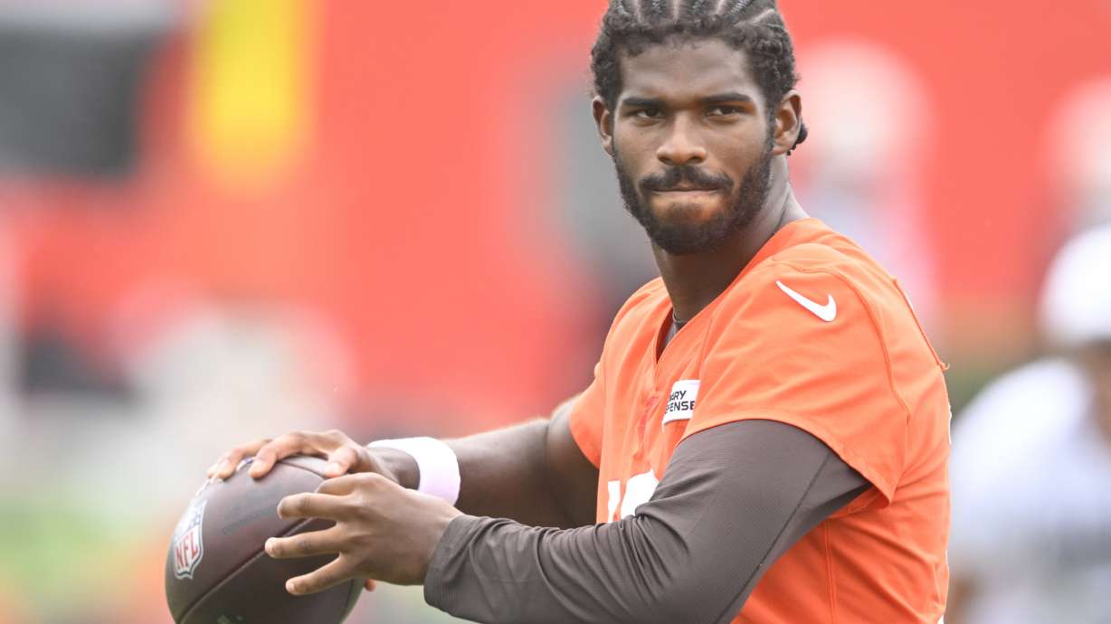 Cleveland Browns quarterback Shedeur Sanders warms up during a practice at the team's NFL football training camp Friday, July 25, 2025, in Berea, Ohio.