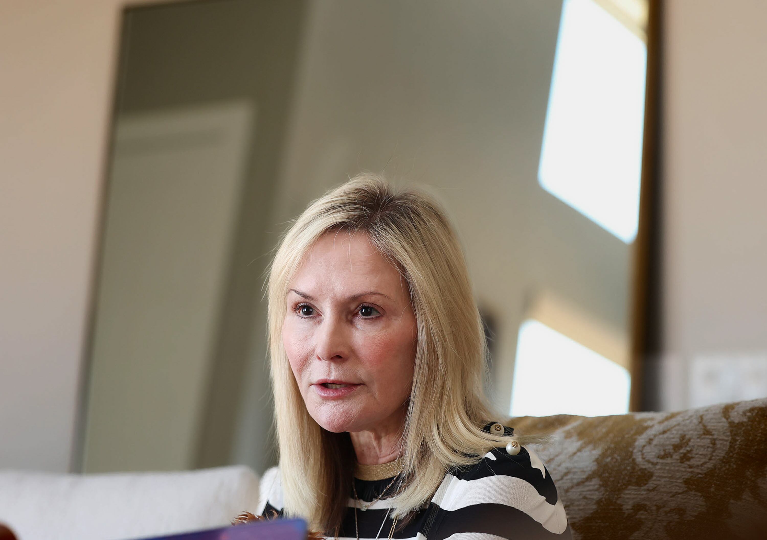 Laura Nelson, Idaho National Laboratory’s regional engagement lead for Utah, at her Holladay home on July 25. Nelson is confident in overcoming hurdles because states are embracing a new vision for energy.