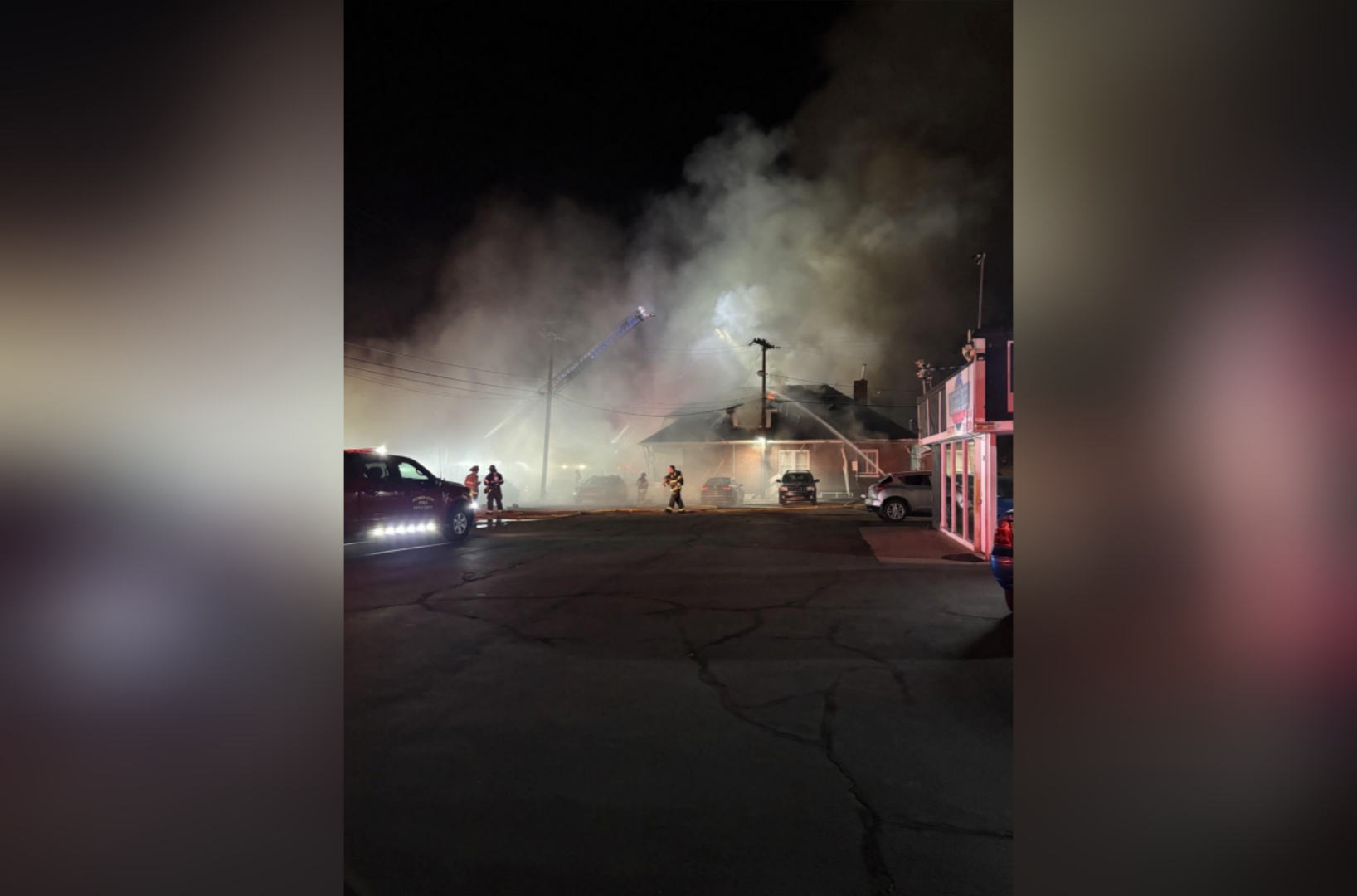 Fire crews battle an apartment fire in Ogden on Monday.
