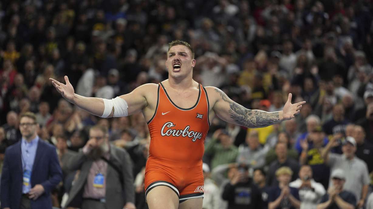 FILE - Oklahoma State's Wyatt Hendrickson reacts after defeating Minnesota's Gable Steveson during a 285-pound match in the finals at the NCAA wrestling championship, Saturday, March 22, 2025, in Philadelphia.