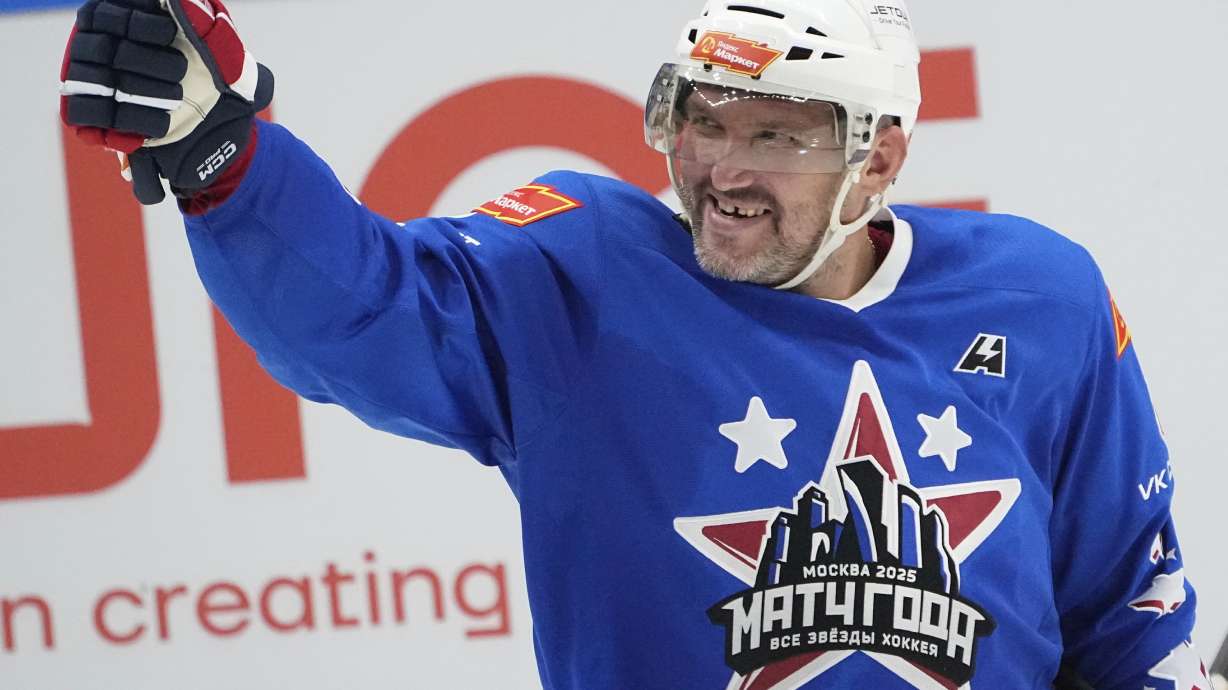 FILE - Team West's Alex Ovechkin reacts during an exhibition match between KHL and NHL All-Star game featuring Russian players from both leagues, at CSKA Arena in Moscow, Russia, Sunday, July 13, 2025.