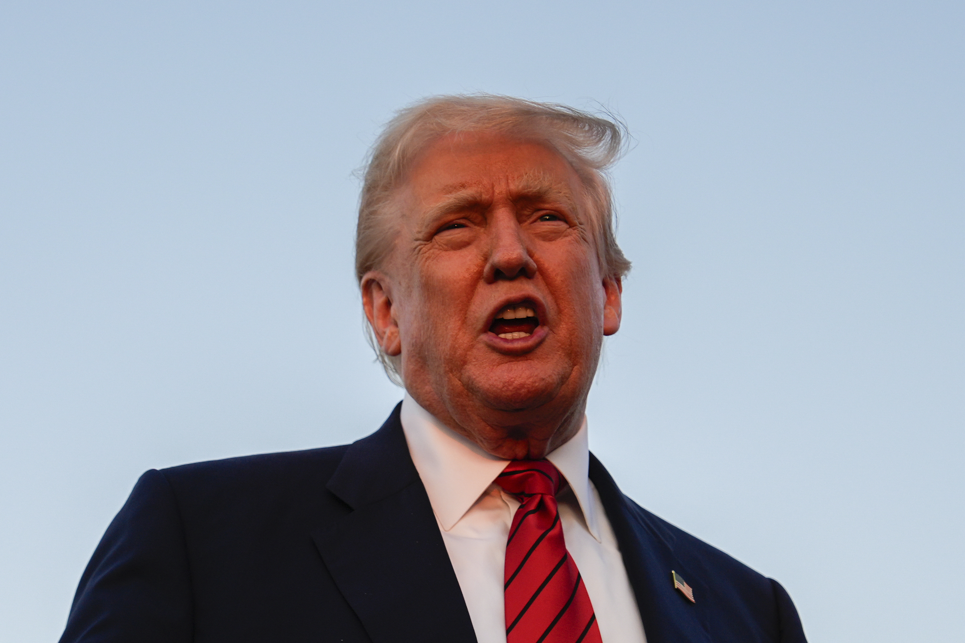 President Donald Trump speaks with reporters before boarding Air Force One at Lehigh Valley International Airport, Sunday, Aug. 3, 2025, in Allentown, Pa.