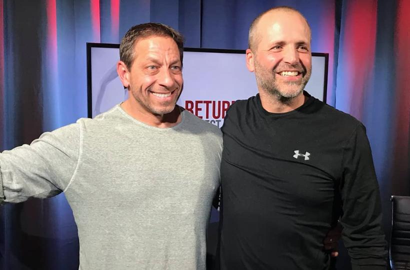 Jon Absey stands with his friend Neil Anderson after they filmed an episode of "Return to Real" for Anderson's YouTube channel in January 2020.