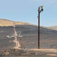 Power poles to be replaced as containment of Monroe Canyon Fire increases