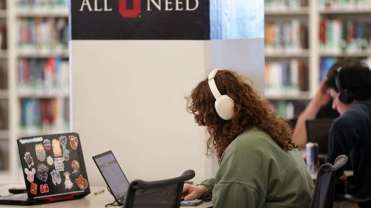 A student studies at the University of Utah in Salt Lake City on March 13, 2024. A new Utah Women and Leadership Project report questions whether Utah's anti-diversity, equity and inclusion initiative law that passed in 2024 has affected women leaders in Utah's K-12 education system.