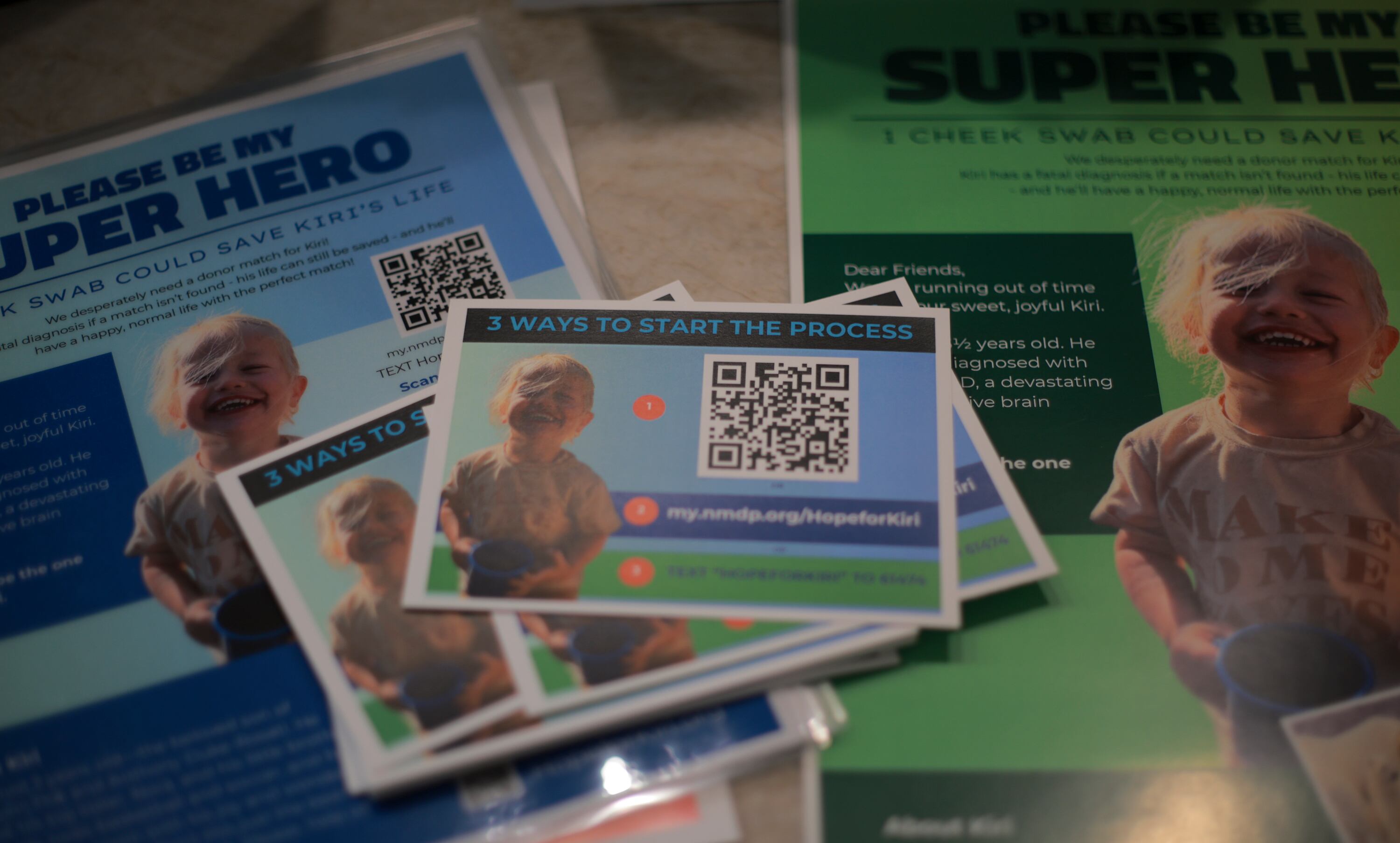 Flyers with information about how to help Kiri Duke-Rosati sit on the counter in his home in Holladay on Monday. Over 1,500 people have registered to potentially be a bone marrow donor for Duke-Rosati.