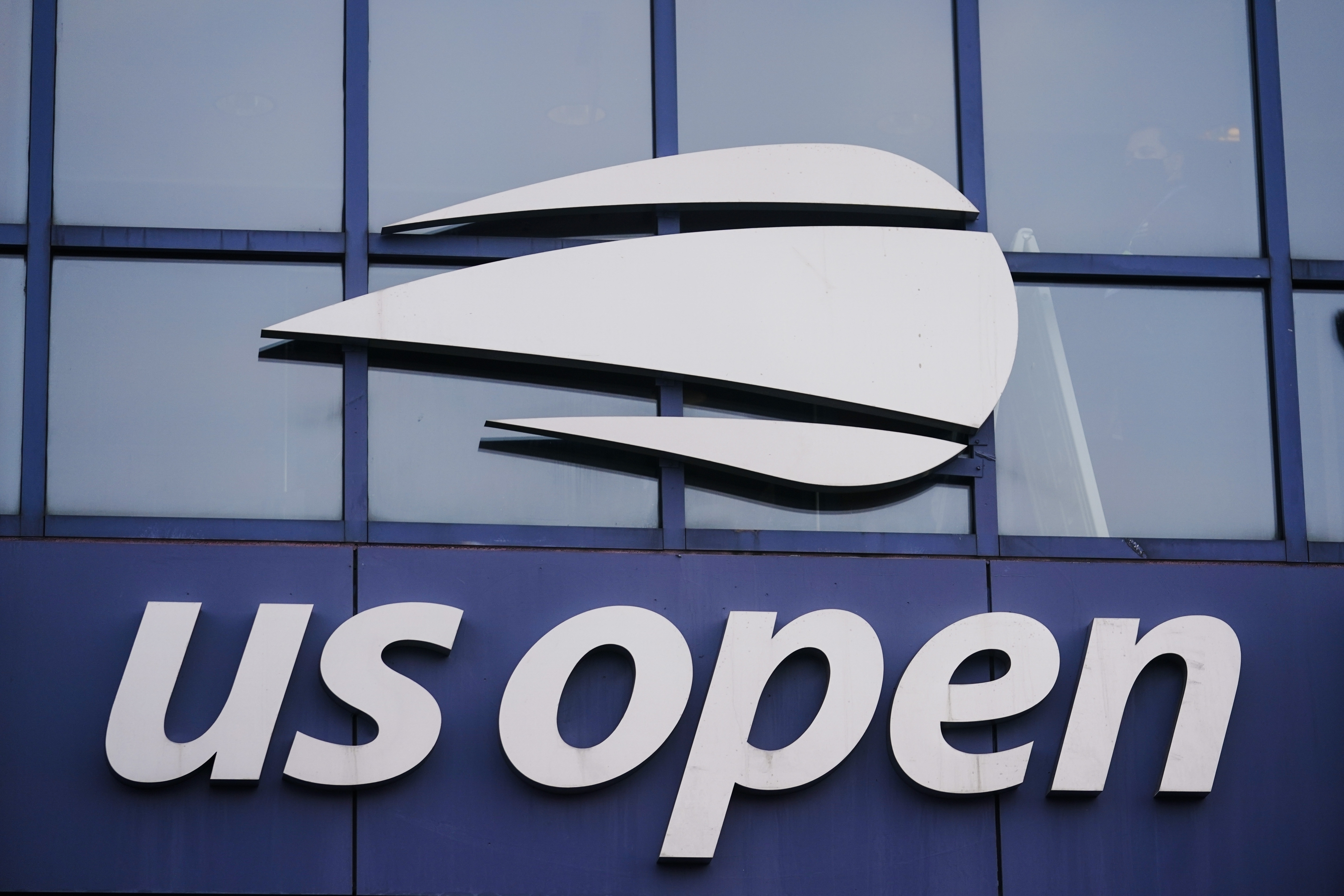 FILE - The U.S. Open logo is shown on the Arthur Ashe Stadium, Thursday, Aug. 27, 2020, in New York.