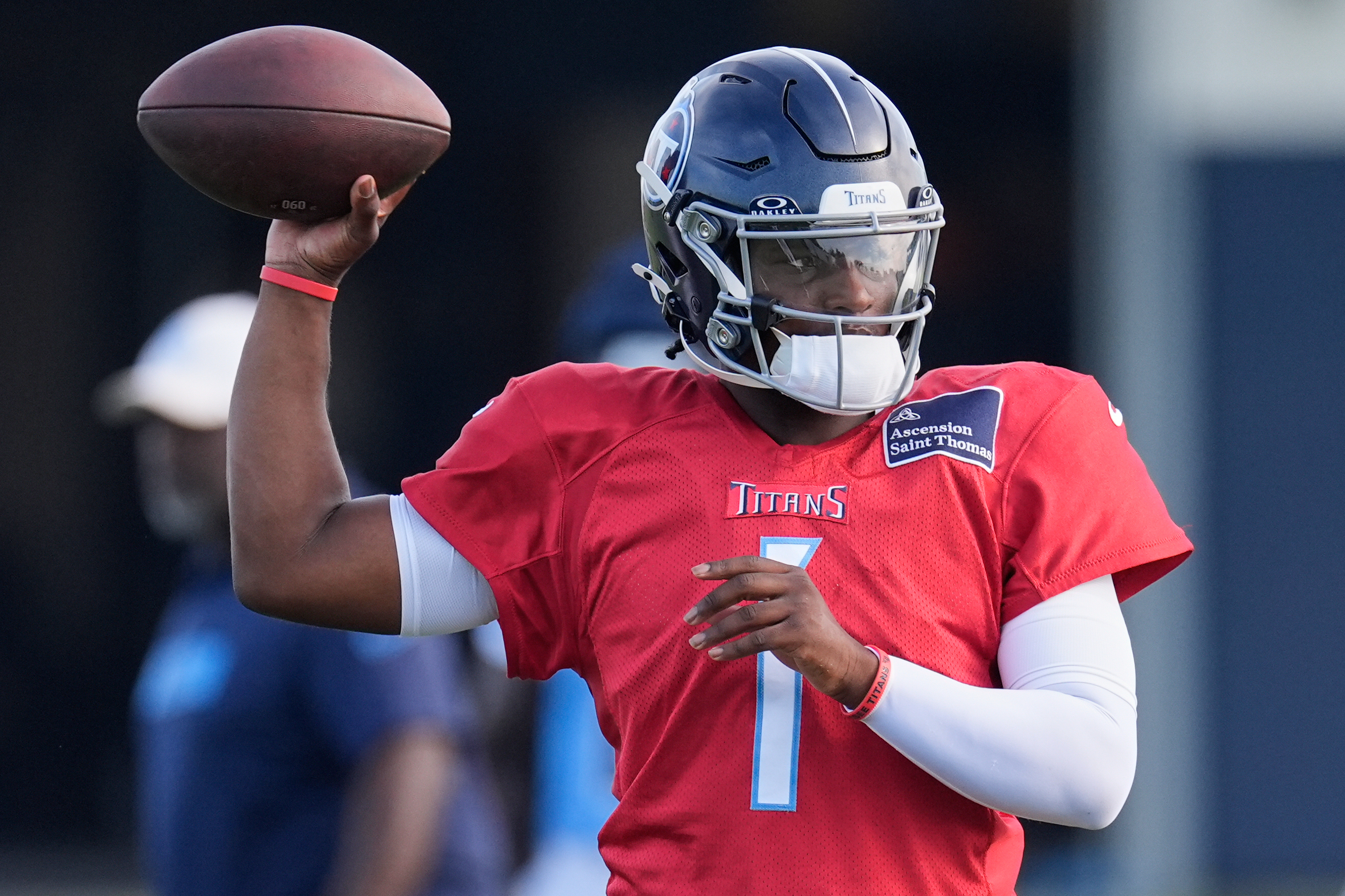 FILE - Tennessee Titans quarterback Cam Ward (1) looks to throw a pass during practice at the team's NFL football training camp Wednesday, July 30, 2025, in Nashville, Tenn.