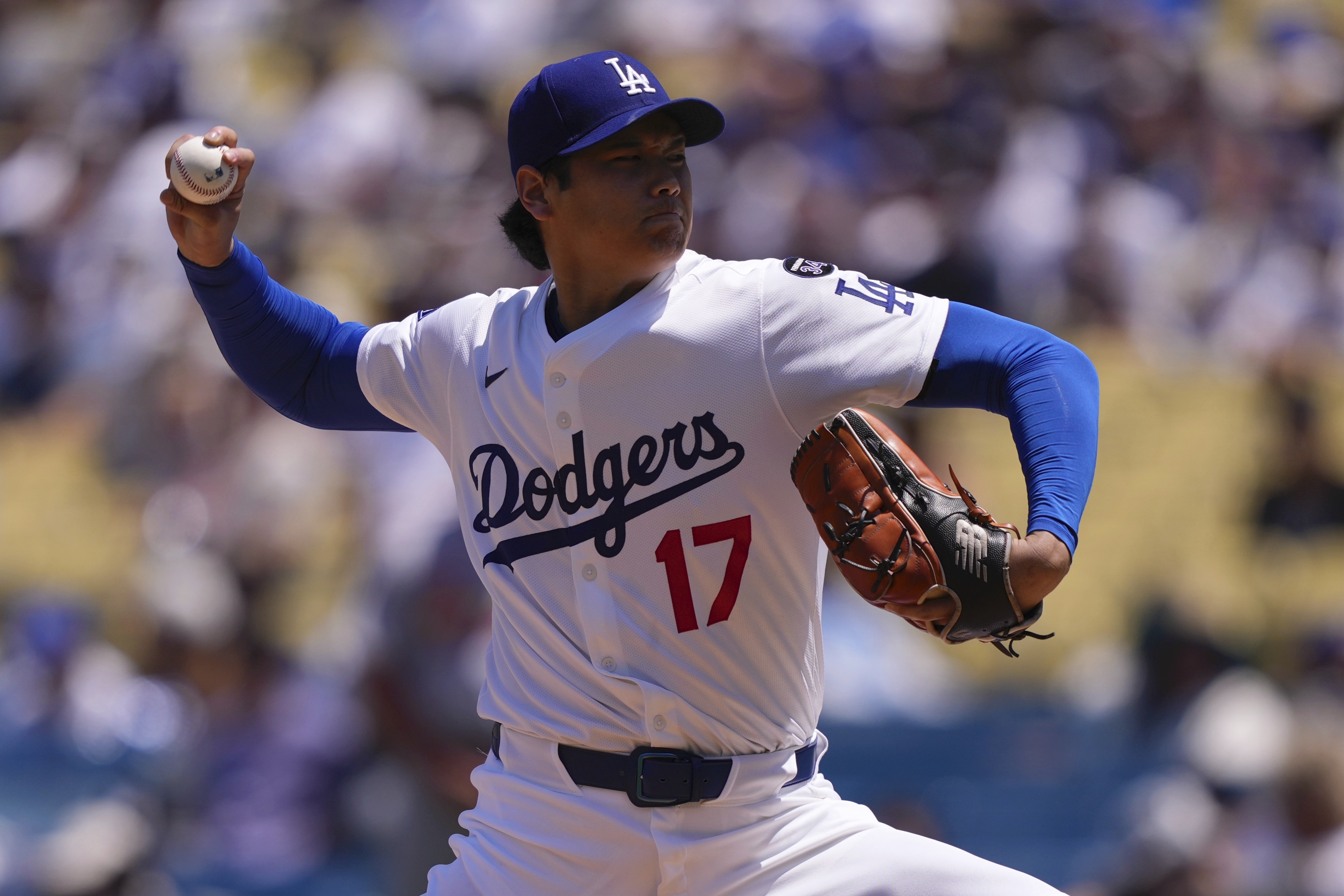 Los Angeles Dodgers starting pitcher Shohei Ohtani throws to the plate during the first inning of a baseball game against the St. Louis Cardinals, Wednesday, Aug. 6, 2025, in Los Angeles.