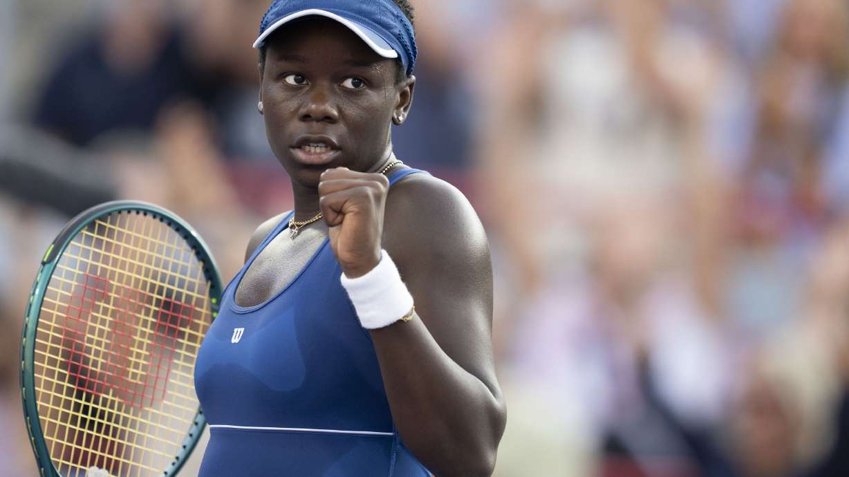 Victoria Mboko, of Canada, reacts during a semifinal match against Elena Rybakina, of Kazakhstan, at the National Bank Open tennis tournament in Montreal, Wednesday, Aug. 6, 2025.