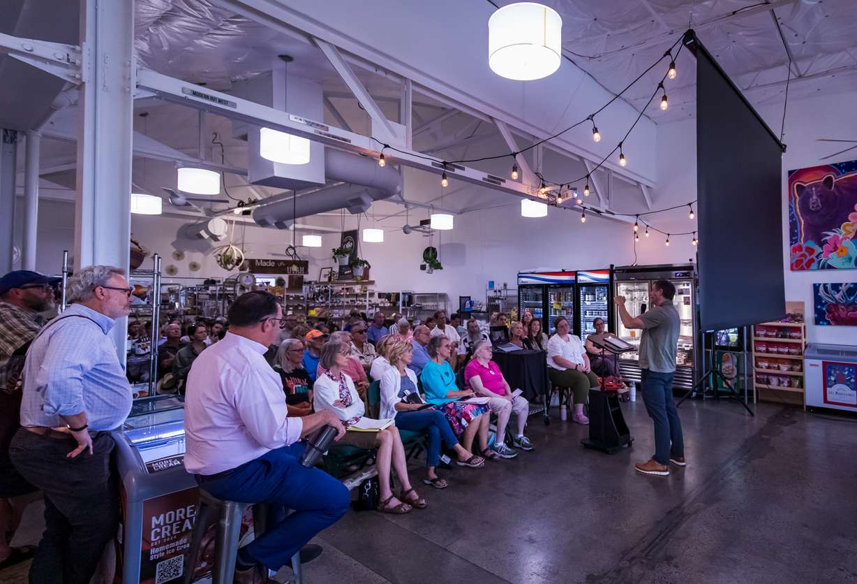 Sugar House residents listen as Salt Lake City planning director Nick Norris answers questions at a Sugar House Community Council meeting at the Neighborhood Hive in Salt Lake City on Wednesday. Norris said there are still several steps before the city decides on whether or not to approve a rezone request tied to a proposed hotel next to Sugar House Park.