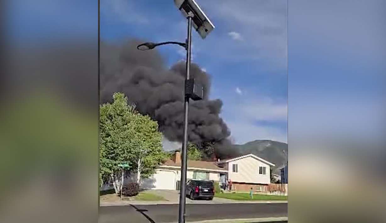 Fire tore through a Tooele neighborhood Wednesday evening, destroying three sheds and damaging five homes.