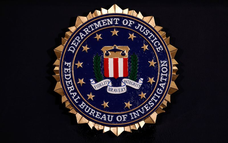 FBI ousts ex-acting director, other agents, in latest purge, people briefed say