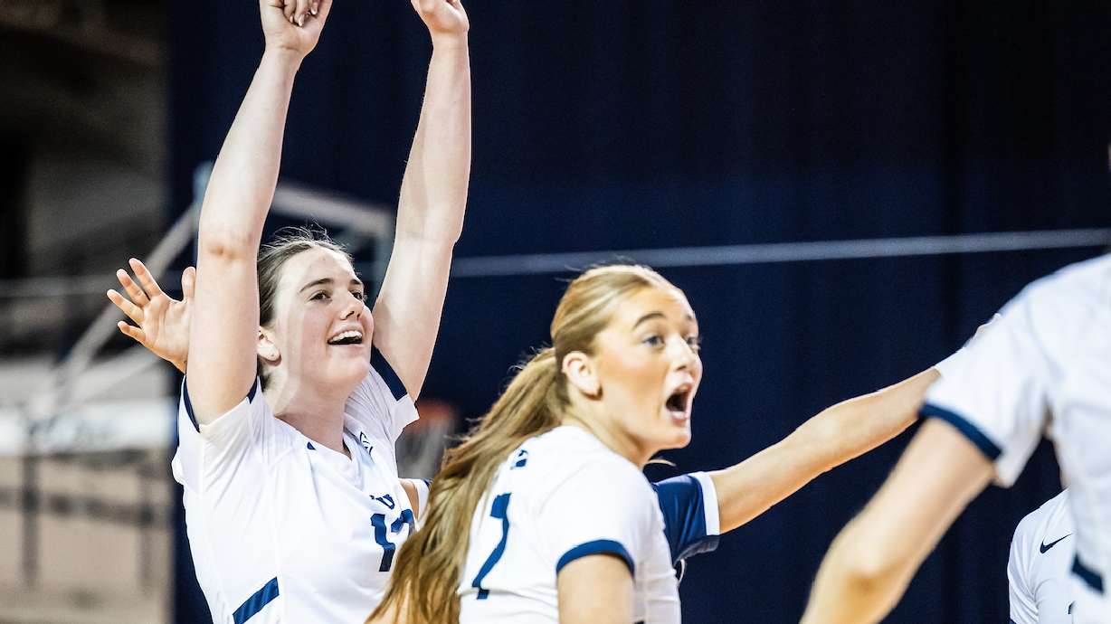 BYU's Claire Little Chambers, left, and Alex Bower celebrate a point during a preseason scrimmage against Weber State, Feb. 28, 2025, in the Smith Fieldhouse in Provo, Utah.