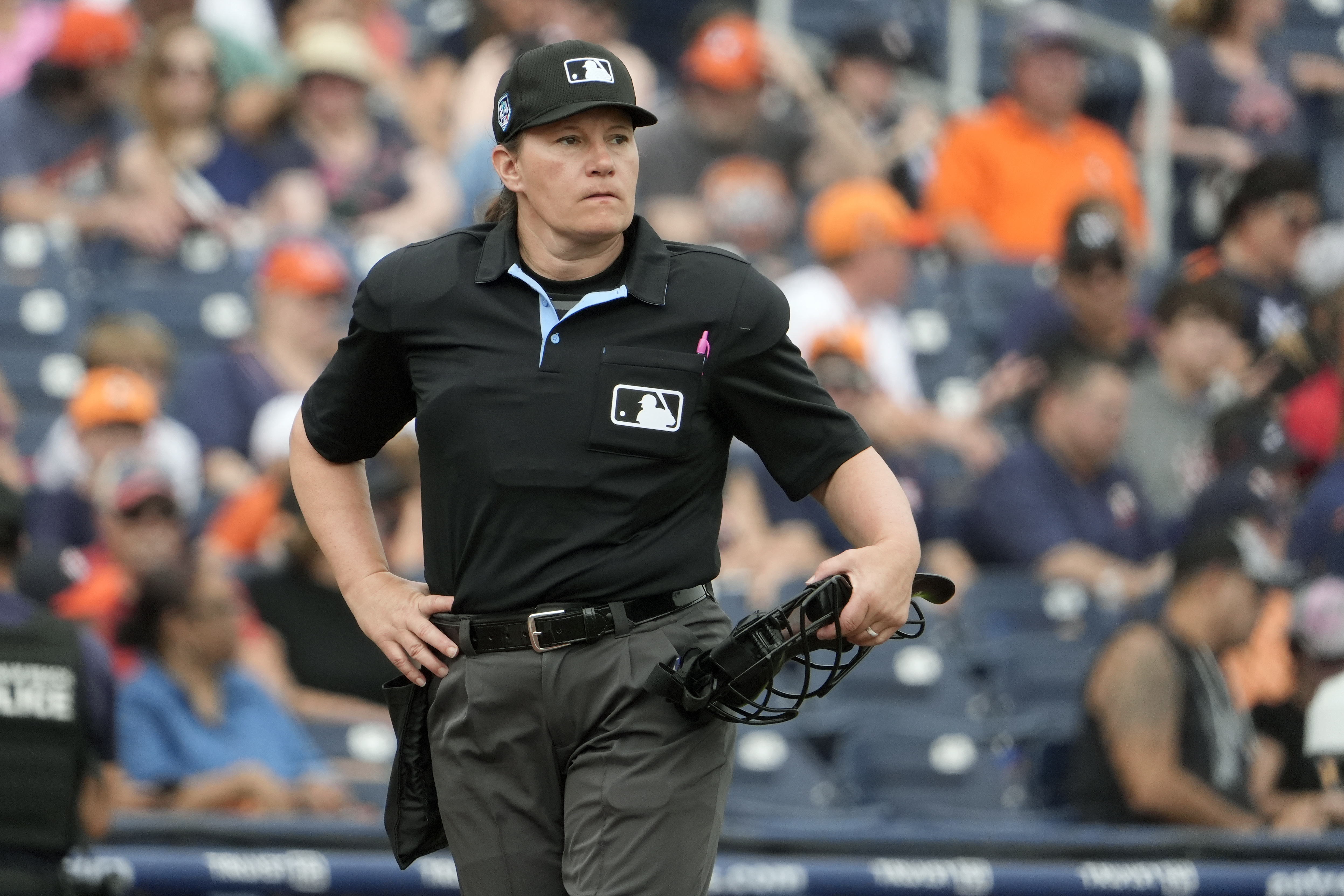 FILE - Home plate umpire Jen Pawol takes her position during the first inning of a spring training baseball game between the Houston Astros and Miami Marlins Sunday, March 10, 2024, in West Palm Beach, Fla.