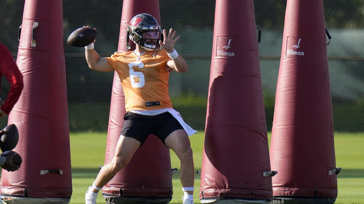 Tampa Bay Buccaneers quarterback Baker Mayfield (6) throws a pass during Back Together Weekend at an NFL football training camp practice Sunday, July 27, 2025, in Tampa, Fla.