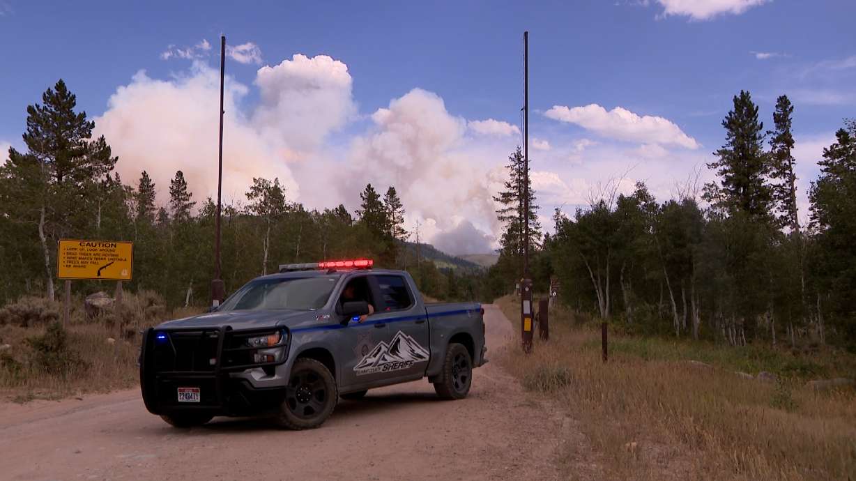 A Summit County Sheriff's Office vehicle near the Beulah Fire on Aug. 7. Utah fire officials are moving state lands to Stage 1 fire restrictions on Thursday, but say people should still be cautious with flames while recreating over the Labor Day weekend.