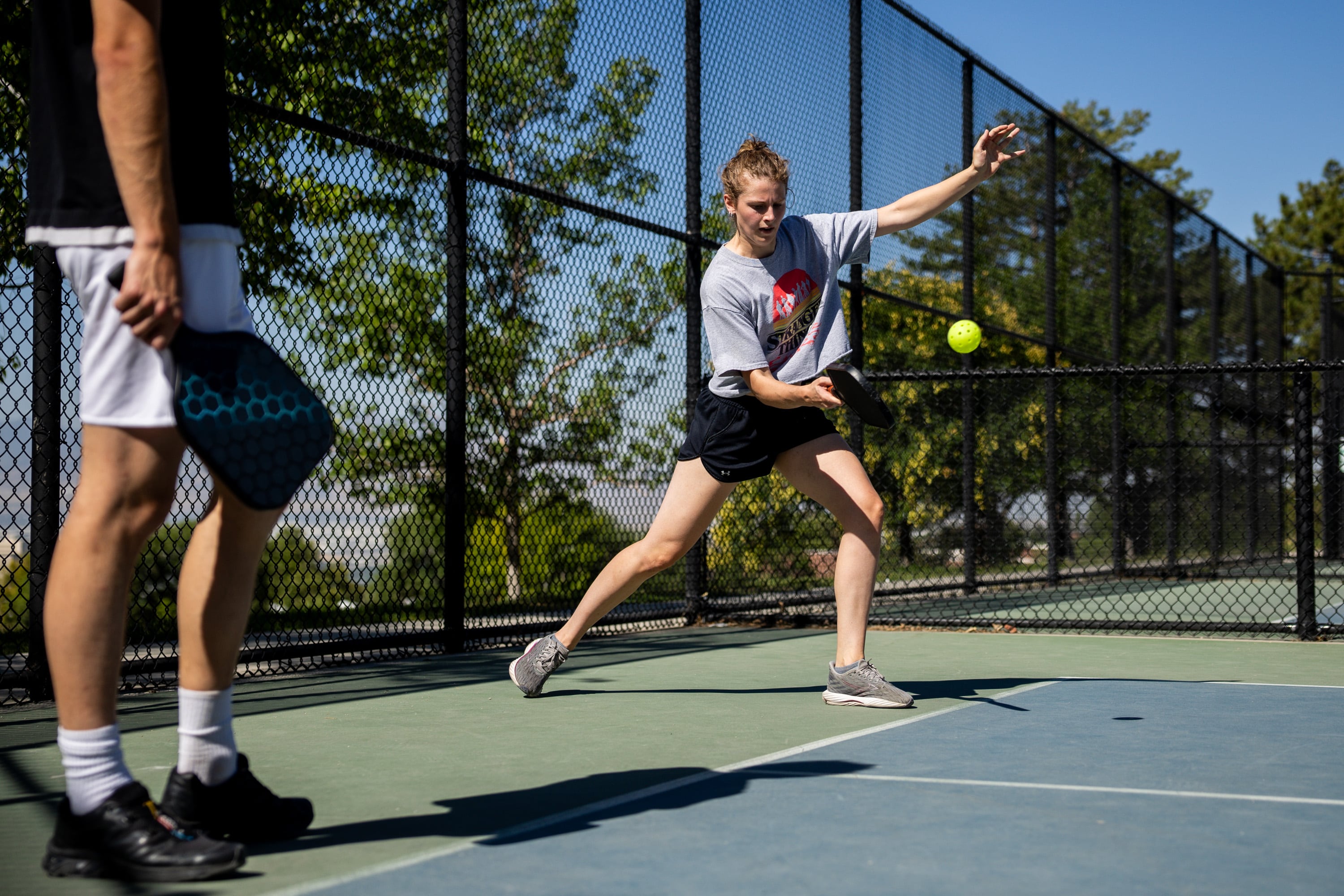 Lincoln Ferrin and Caprina Mathias play pickleball in Salt Lake City on Thursday. The Action Network said Utah is one of the states most obsessed with pickleball, the fastest-growing sport nationwide for the fourth consecutive year.