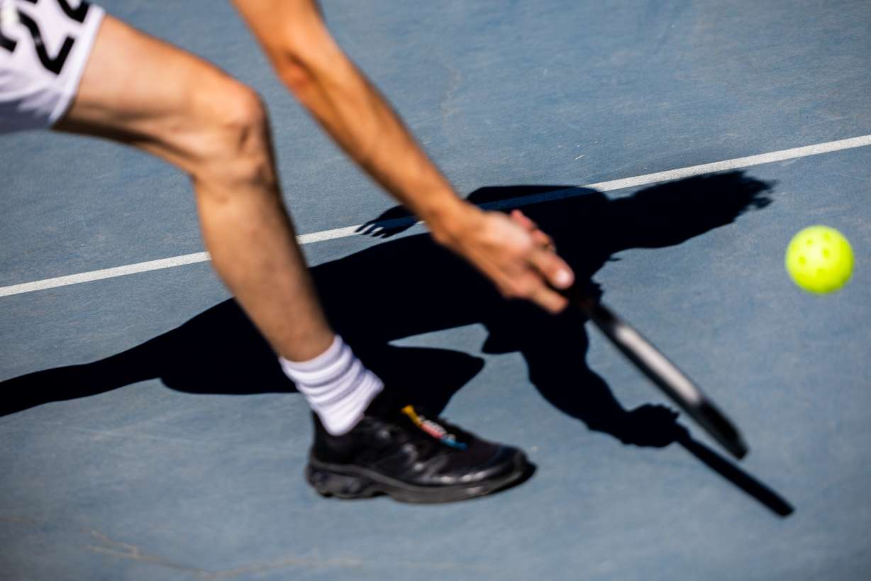 Lincoln Ferrin plays pickleball in Salt Lake City on Thursday. Pickleball is the fastest-growing sport nationwide for the fourth year in a row, The Action Network said.